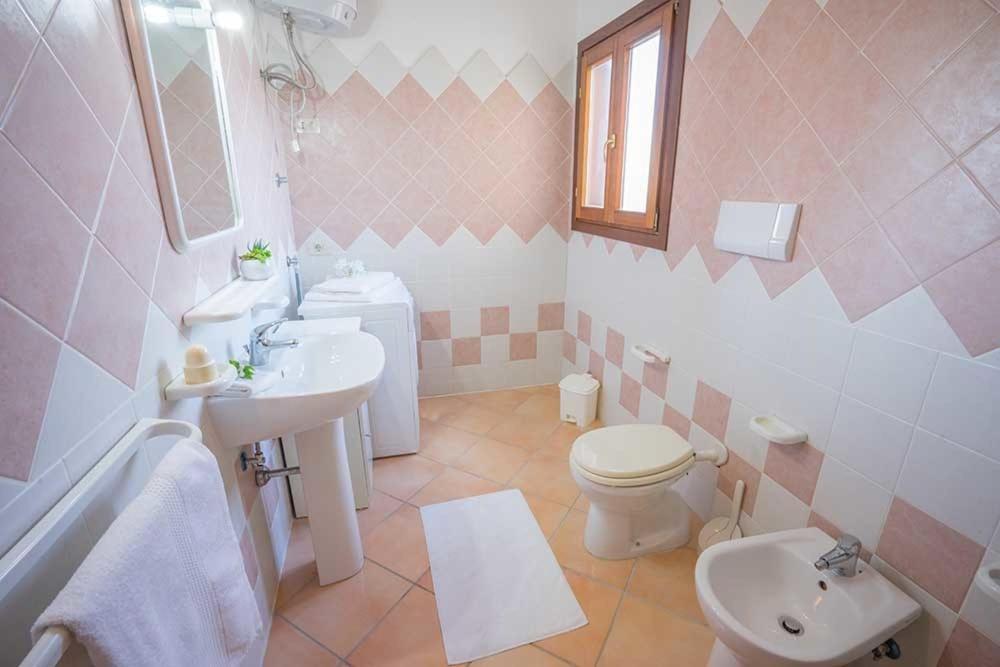 Residence Baia Sant Anna Con Piscina Tanaunella Bagian luar foto
